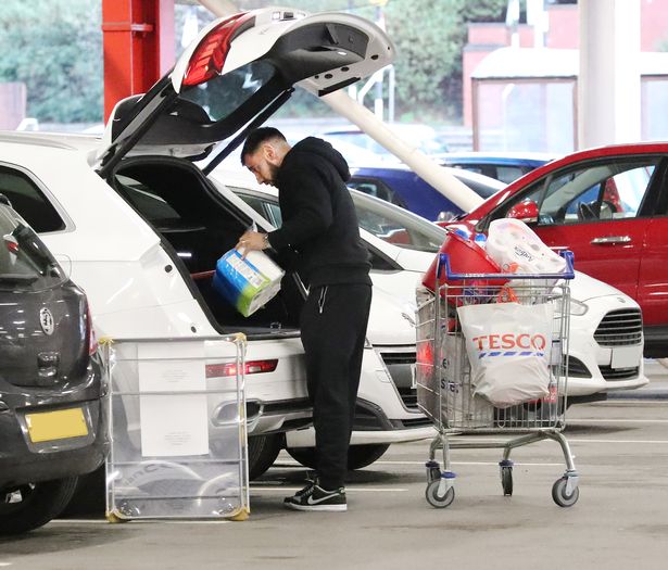 Man Utd star Bruno Fernandes pictured shopping at Tesco with his wife -  Daily Star