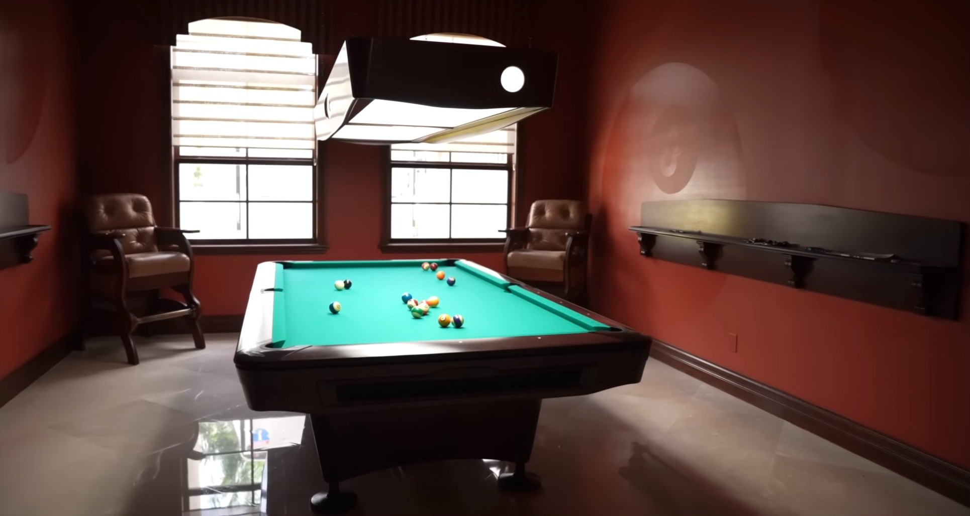 Hill's home features a games room with a pool table