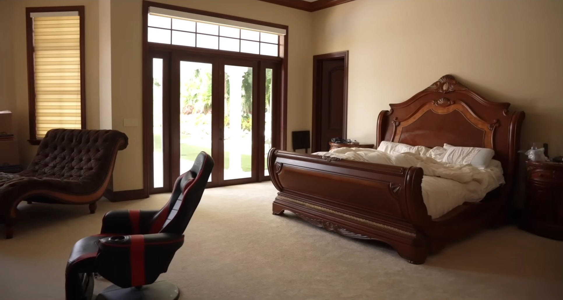 His master bedroom overlooks the swimming pool and basketball court